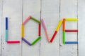 Love spelled with colorful pastels