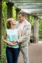 Love story. Romantic couple in relationship in park, garden. Autumn Royalty Free Stock Photo