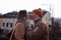 In love stylish young couple kissing in the city. Fashion outdoor sensual romantic portrait of beautiful young couple Royalty Free Stock Photo