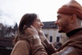 In love stylish young couple kissing in the city. Fashion outdoor sensual romantic portrait of beautiful young couple hugs and Royalty Free Stock Photo