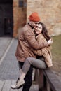 In love stylish young couple kissing in the city. Fashion outdoor sensual romantic portrait of beautiful young couple hugs and Royalty Free Stock Photo