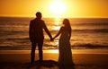 Love, summer and couple at a beach at sunset, silhouette holding hands and bonding with ocean views in nature. Romance Royalty Free Stock Photo