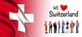 We love Switzerland, A group of people pose next to the Swiss flag Royalty Free Stock Photo