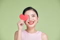 Love symbol. Beautiful girl holding a heart, office manager concept shot