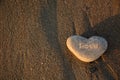 Love symbol. Heart of stone on the pebble beach. Valentine background Royalty Free Stock Photo