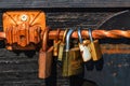 Love symbol, old rusty padlocks hanging on wooden fortress bridge in Alba Iulia, Romania, 2021