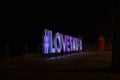 Love Taupo promotional sign at night