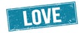 LOVE text on blue grungy rectangle stamp