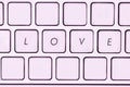 Love text on computer keyboard.concepts of online dating Royalty Free Stock Photo