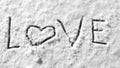 Love text Hearts on snow hand drawing symbol romantic wintertime