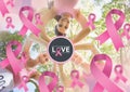 Love text and pink ribbons with breast cancer awareness women putting hands together Royalty Free Stock Photo