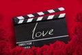 Love, text title on clapper board.