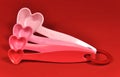 Love theme pink and red heart shape measuring spoons Royalty Free Stock Photo