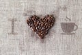 Love to coffee - Burlap texture with beans heart shape Royalty Free Stock Photo