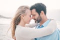 Love, touching face and couple at beach for holiday, vacation and weekend for anniversary. Intimacy, marriage and loving Royalty Free Stock Photo