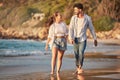 Love, travel and happy with couple at the beach holding hands on Cancun summer vacation for relax, peace and support Royalty Free Stock Photo