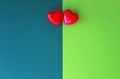 Love, two red hearts side by side