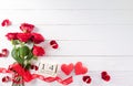 Love and Valentine\'s day concept made from red hearts wooden calendar and rose