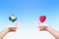 Love and Valentine`s Day conceptÃ¯Â¼Å¡People open hands holding heart shape Royalty Free Stock Photo