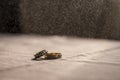 Love, Valentine`s day and wedding concept. Two wedding rings with man and woman hands blurred in the background. Selective focus Royalty Free Stock Photo