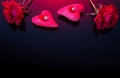 Love and Valentine's day concept made from red roses and candles on black background. Royalty Free Stock Photo