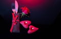 Love and Valentine's day concept made from red roses and candles on black background. Royalty Free Stock Photo