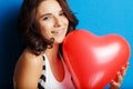 Love and valentines day woman holding heart smiling cute and ado