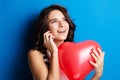 Love and valentines day woman holding heart smiling cute and ado