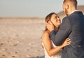 Love, wedding and bride and groom embrace in celebration of marriage at outdoor venue. Nature, field and couple looking Royalty Free Stock Photo