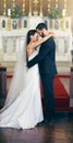 Love, wedding and couple dance in church in celebration of the bride and grooms faithful commitment in marriage. Romance
