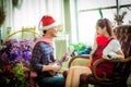 love, wedding, winter, dating and people concept - smiling couple in Play Ukulele.