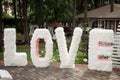 Love white letters . Outdoor decor photo. Love standing letters for wedding photography