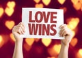 Love Wins card with bokeh background Royalty Free Stock Photo