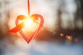 Love in winter. Heart shaped symbol Valentine Day. heart with hands, Feelings and Lifestyle concept on the sunset light Royalty Free Stock Photo