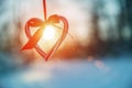 Love in winter. Heart shaped symbol Valentine Day. heart with hands, Feelings and Lifestyle concept on the sunset light Royalty Free Stock Photo