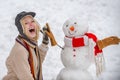 Love winter. Sensual winter girl posing and having fun. Girl in snow. Winter scene with happy people on white snow Royalty Free Stock Photo