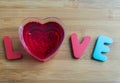 Love wooden word on wood floor Royalty Free Stock Photo