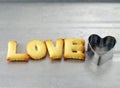 love word, preparing baking homemade cracker for valentine day Royalty Free Stock Photo