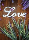 Love word card with retro wooden background and lavender Royalty Free Stock Photo