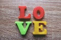 `love` word Close-up shot with a selective focus of the colorful magnetic letters for Valentine`s Day Royalty Free Stock Photo