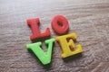 `love` word Close-up shot with a selective focus of the colorful magnetic letters for Valentine`s Day Royalty Free Stock Photo