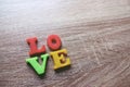 `love` word Close-up shot with a selective focus of the colorful magnetic letters for Valentine`s Day Royalty Free Stock Photo