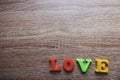 `love` word Close-up shot with a selective focus of the colorful magnetic letters for Valentine`s Day Royalty Free Stock Photo