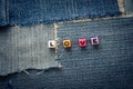 Love word on a jeans Royalty Free Stock Photo