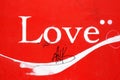 Love sign Valentine Day background word against a red wall Royalty Free Stock Photo