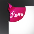 Love word uncovered from torn paper corner. Royalty Free Stock Photo