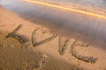 Love word written in sand Royalty Free Stock Photo