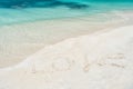 Love word written on white sand in st johns, antigua Royalty Free Stock Photo