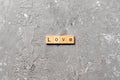Love word written on wood block. love text on table, concept Royalty Free Stock Photo