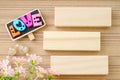 LOVE wording and blank wooden tag. Love concept. Royalty Free Stock Photo
